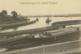 Blick auf die Hafenanlagen mit der Schachtschleuse im Hintergrund. Foto:©Mindener Museum)