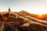 Strand auf Sylt mit Leuchtturm, Foto: Presse Sylt - Marketing