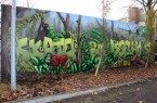 Auf der Rückseite der Betonwand zur Skate-Anlage an der Grundschule Isselhorst ist jetzt auf 55 Quadratmetern ein weiteres Kunstwerk entstanden. Foto: Graffito Skate Park Isselhorst